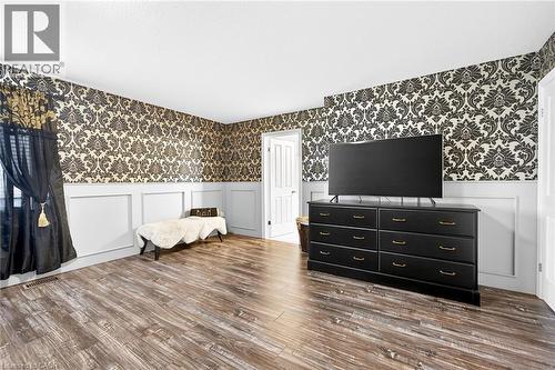 Primary bedroom with double walk in closets and 5 pc ensuite bathroom - 182 Irwin Avenue, Hamilton, ON - Indoor Photo Showing Other Room