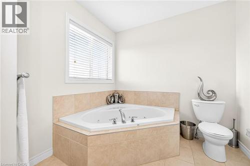 Bathroom with a whirlpool tub - 182 Irwin Avenue, Hamilton, ON - Indoor Photo Showing Bathroom