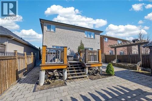 Back of house with a fenced backyard, a patio, a deck - 182 Irwin Avenue, Hamilton, ON - Outdoor With Deck Patio Veranda