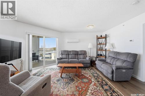 401 303 Lowe Road, Saskatoon, SK - Indoor Photo Showing Living Room