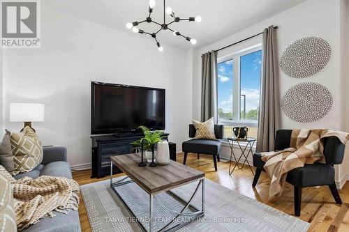 36 Dockside Way, Whitby, ON - Indoor Photo Showing Living Room