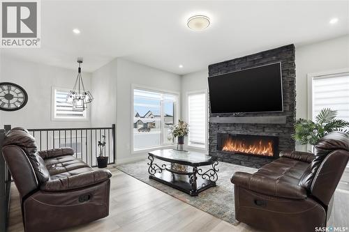 271 Dziadyk Manor, Saskatoon, SK - Indoor Photo Showing Living Room With Fireplace