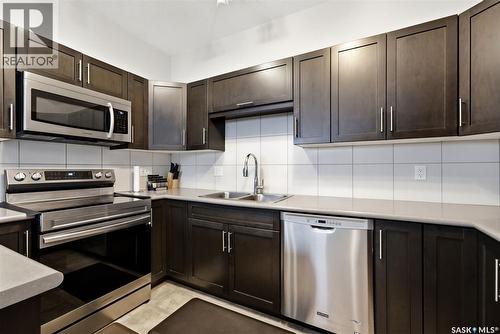 4609 Green Rock Road E, Regina, SK - Indoor Photo Showing Kitchen With Stainless Steel Kitchen With Double Sink