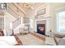 6746 Marbella Loop Unit# 304, Kelowna, BC  - Indoor Photo Showing Living Room With Fireplace 