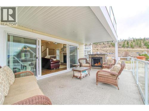 6746 Marbella Loop Unit# 304, Kelowna, BC - Outdoor With Fireplace With Deck Patio Veranda With Exterior