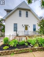 View of front of house featuring a deck - 