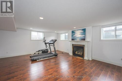 1615 Wickerson Gate, London South (South K), ON - Indoor Photo Showing Gym Room With Fireplace
