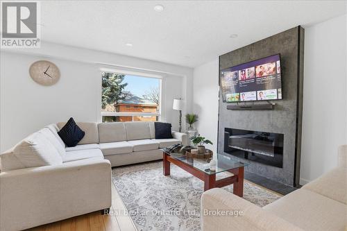 9 Holm Street, Cambridge, ON - Indoor Photo Showing Living Room With Fireplace