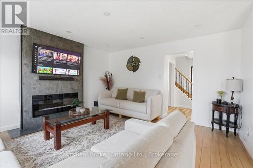 9 Holm Street, Cambridge, ON - Indoor Photo Showing Living Room With Fireplace