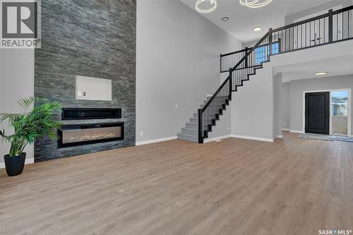 4327 Wild Rose Drive, Regina, SK - Indoor With Fireplace