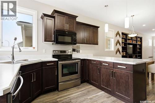 5381 Mckenna Crescent, Regina, SK - Indoor Photo Showing Kitchen With Double Sink With Upgraded Kitchen