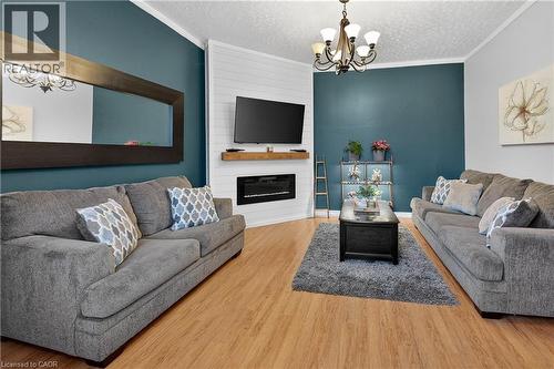 Main Level - Living Room - 287 Main Street E, Grimsby, ON - Indoor Photo Showing Living Room With Fireplace