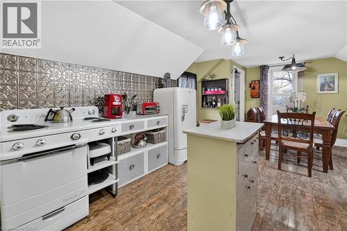 Upper Level - Kitchen & Dining Area with access to upper deck - 287 Main Street E, Grimsby, ON - Indoor Photo Showing Kitchen