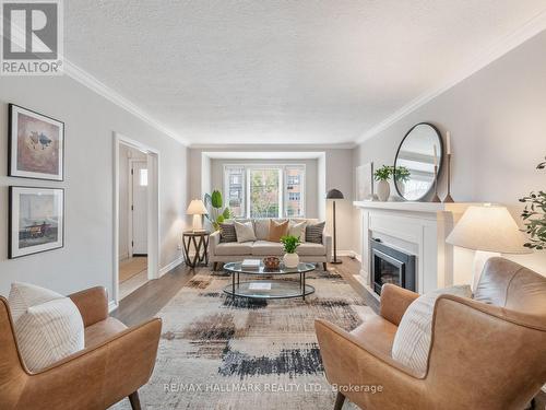 8 Glenvale Boulevard, Toronto, ON - Indoor Photo Showing Living Room With Fireplace