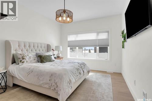 9 437 Palmer Crescent, Warman, SK - Indoor Photo Showing Bedroom