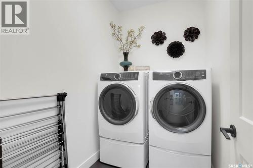 9 437 Palmer Crescent, Warman, SK - Indoor Photo Showing Laundry Room