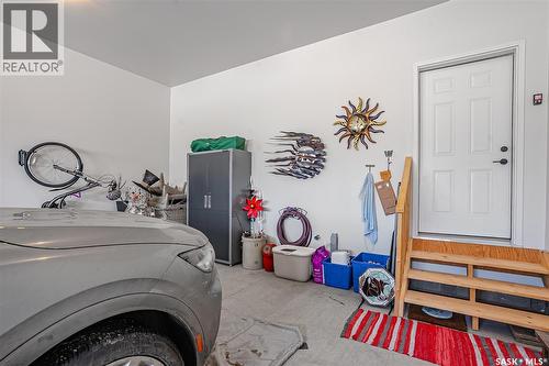 9 437 Palmer Crescent, Warman, SK - Indoor Photo Showing Laundry Room