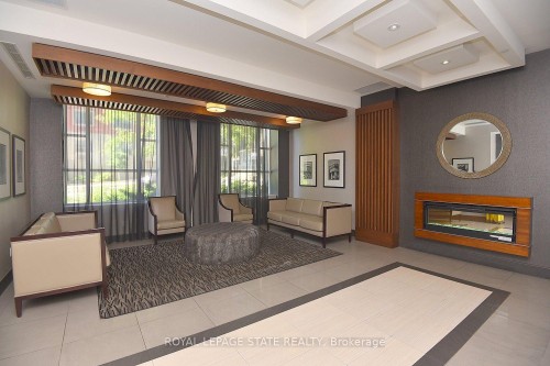 603-150 Main Street W, Hamilton, ON - Indoor With Fireplace