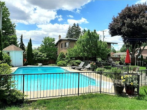 Extérieur - 1004 Av. Suzanne, Laval (Saint-Vincent-De-Paul), QC - Outdoor With In Ground Pool