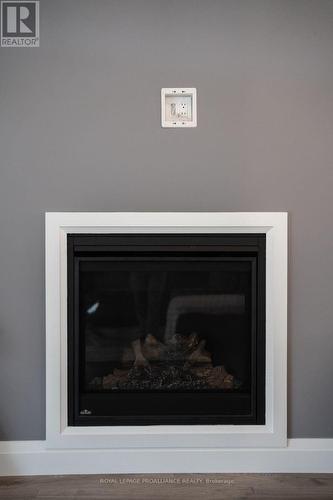 5 Mackenzie John Crescent, Brighton, ON - Indoor Photo Showing Living Room With Fireplace
