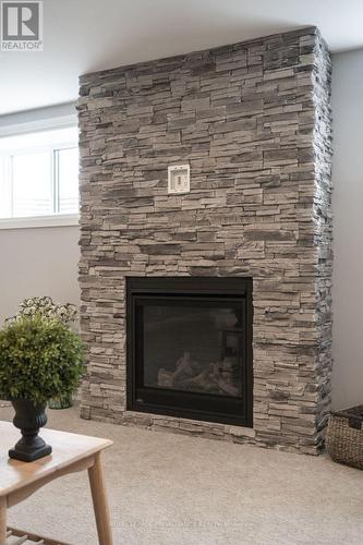 5 Mackenzie John Crescent, Brighton, ON - Indoor Photo Showing Living Room With Fireplace