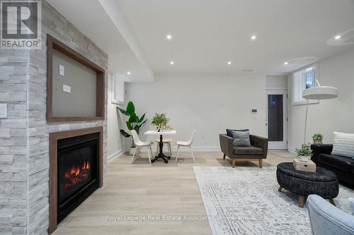 Family Room - 63 Troy Street, Mississauga, ON - Indoor Photo Showing Living Room With Fireplace