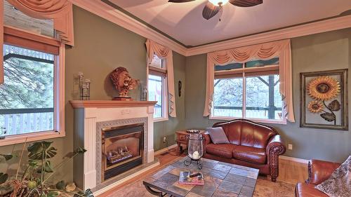 5312 Kennedy Road, Cranbrook, BC - Indoor Photo Showing Living Room With Fireplace