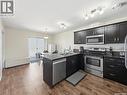 209 3818 Dewdney Avenue E, Regina, SK  - Indoor Photo Showing Kitchen With Double Sink 