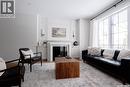 2808 Fleury Street, Regina, SK  - Indoor Photo Showing Living Room With Fireplace 