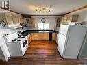 103 1St Street E, Frontier, SK  - Indoor Photo Showing Kitchen 
