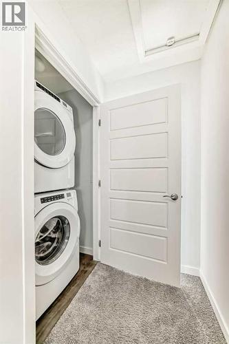 263 Redstone Boulevard Ne, Calgary, AB - Indoor Photo Showing Laundry Room