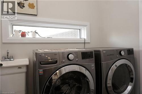 Laundry area featuring independent washer and dryer - 63 Ian Ormston Drive, Kitchener, ON - Indoor Photo Showing Laundry Room