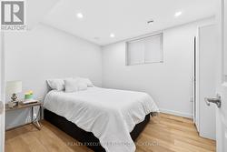 Basement - Bedroom #1 w/ large window - 