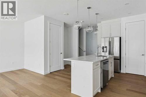 25 Linden Place, Rural Red Deer County, AB - Indoor Photo Showing Kitchen With Upgraded Kitchen