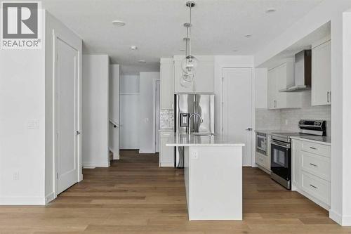 25 Linden Place, Rural Red Deer County, AB - Indoor Photo Showing Kitchen With Upgraded Kitchen