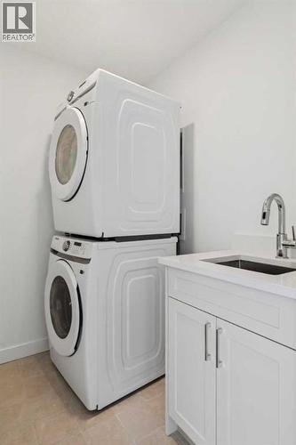 25 Linden Place, Rural Red Deer County, AB - Indoor Photo Showing Laundry Room