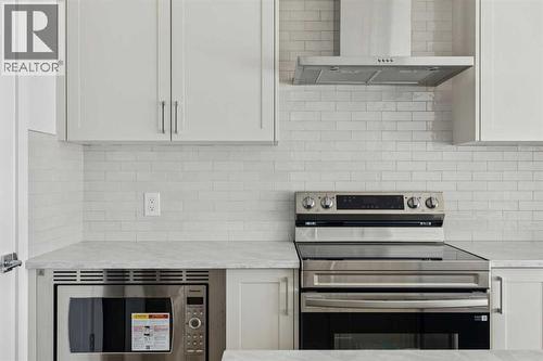 25 Linden Place, Rural Red Deer County, AB - Indoor Photo Showing Kitchen
