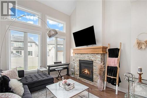 427 Rainrock Crescent, Ottawa, ON - Indoor Photo Showing Living Room With Fireplace