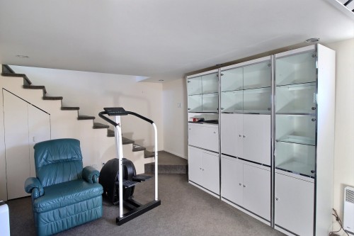 Salle familiale - 193 Av. George, Rouyn-Noranda, QC - Indoor Photo Showing Gym Room