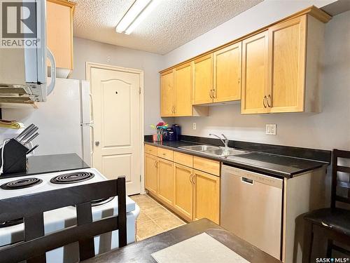 106A 1121 Mckercher Drive, Saskatoon, SK - Indoor Photo Showing Kitchen With Double Sink