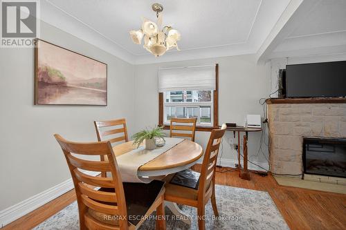 144 Hunter Street W, Hamilton, ON - Indoor Photo Showing Dining Room With Fireplace