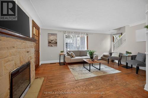 144 Hunter Street W, Hamilton, ON - Indoor Photo Showing Living Room With Fireplace