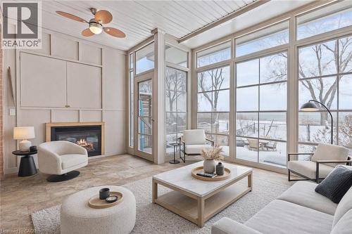 virtually staged - 1069 Beach Boulevard, Hamilton, ON - Indoor Photo Showing Living Room With Fireplace