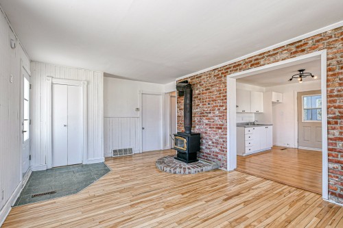 Salon - 802  - 804 20E Avenue, Saint-Jérôme, QC - Indoor With Fireplace