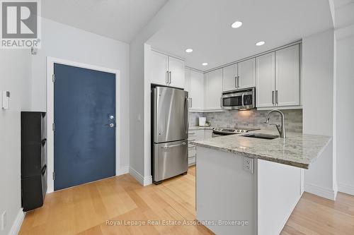 1407 - 551 Maple Avenue, Burlington, ON - Indoor Photo Showing Kitchen With Stainless Steel Kitchen With Upgraded Kitchen
