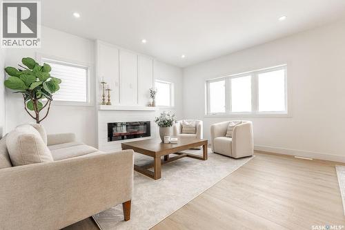 307 Sharma Crescent, Saskatoon, SK - Indoor Photo Showing Living Room With Fireplace