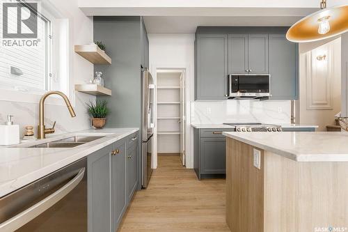 307 Sharma Crescent, Saskatoon, SK - Indoor Photo Showing Kitchen With Double Sink With Upgraded Kitchen