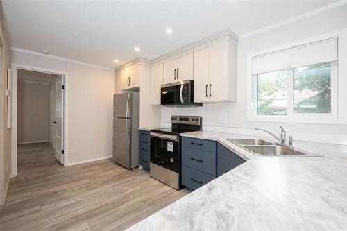 85 Sandale Drive, Winnipeg, MB - Indoor Photo Showing Kitchen With Stainless Steel Kitchen With Double Sink