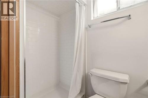 Bathroom with a shower stall and toilet - 890 Falcon Boulevard, Burlington, ON - Indoor Photo Showing Bathroom