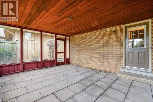 Unfurnished sunroom featuring plenty of natural light - 890 Falcon Boulevard, Burlington, ON - Outdoor With Exterior
